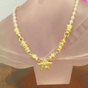 Pearl necklace with gold color trim